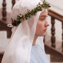 A fátyol mögött